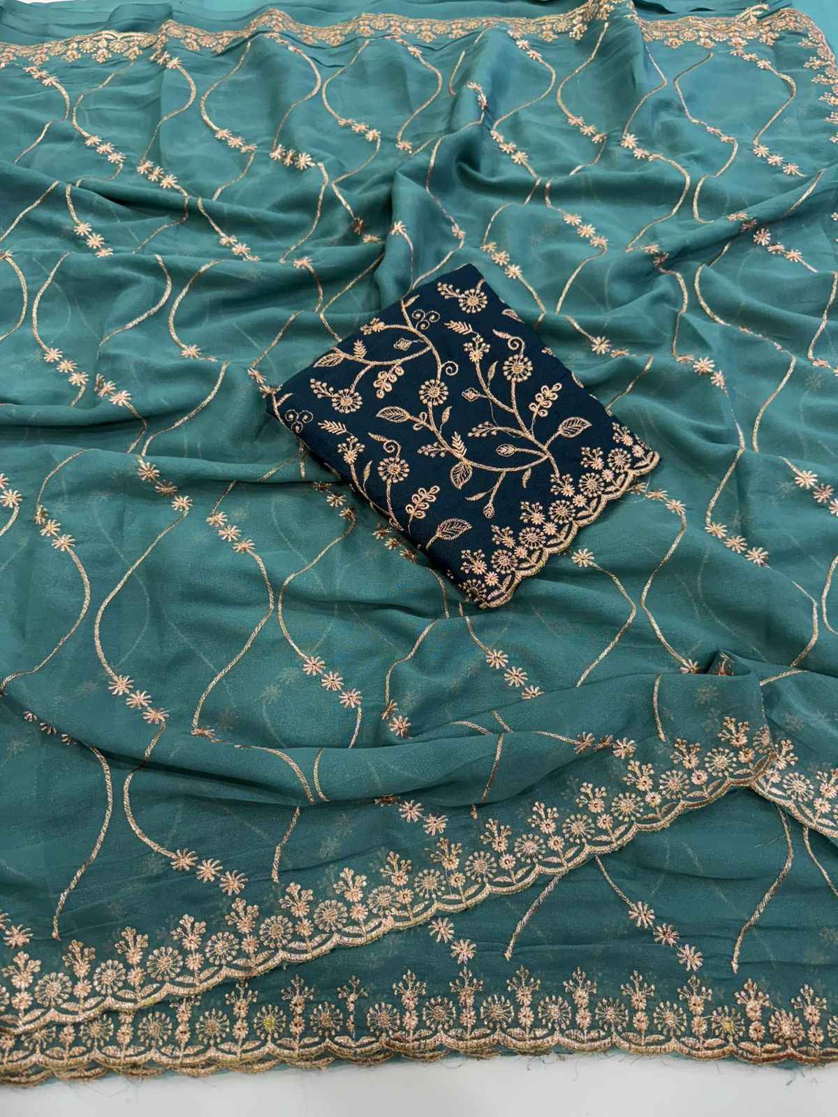 emerald grace georgette embroidered saree - yooneck