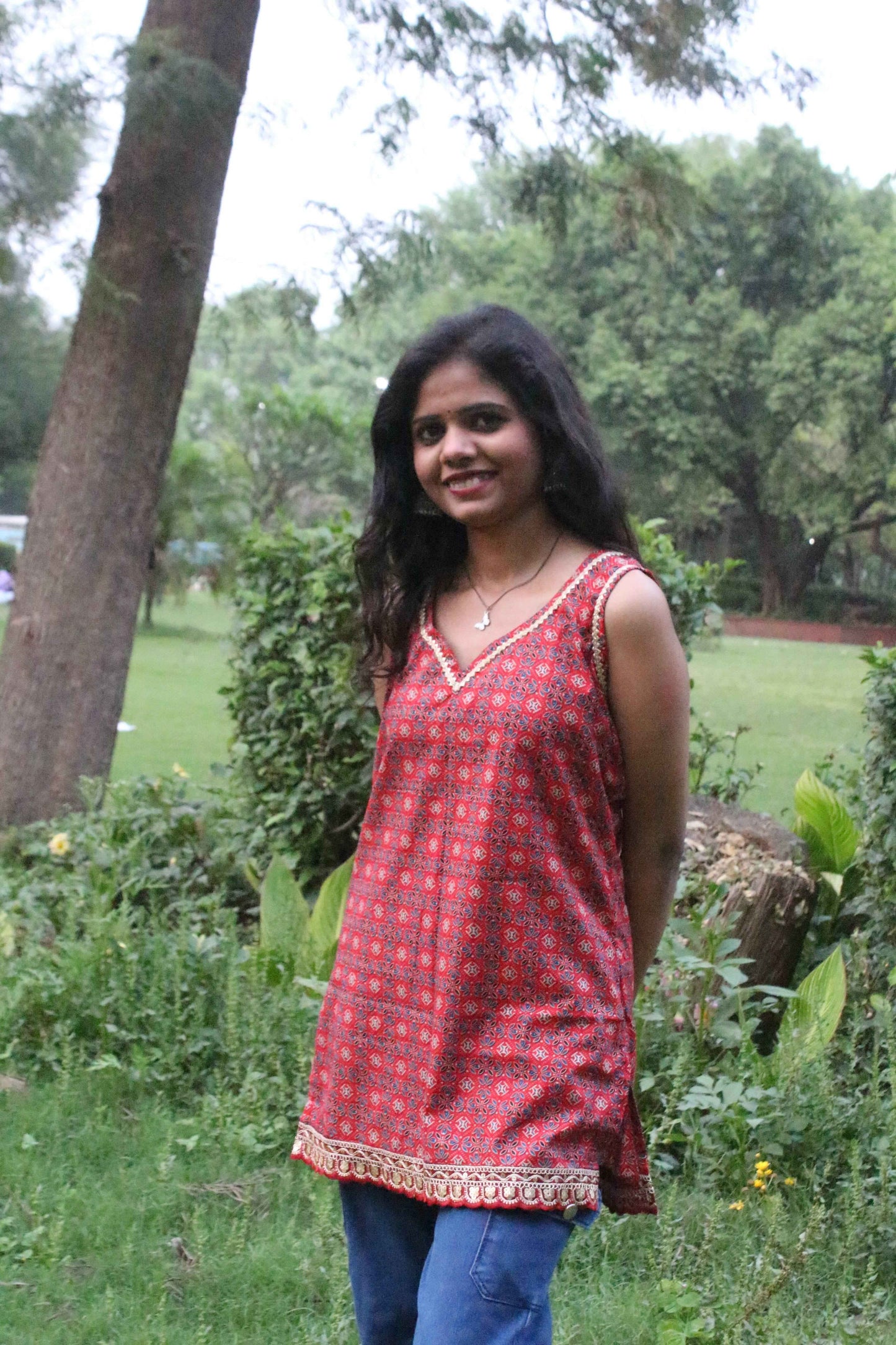 rust charm sleeveless kurti - yooneck