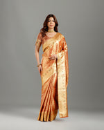 Graceful Rust Tissue Silk Saree with Self Weaving Design