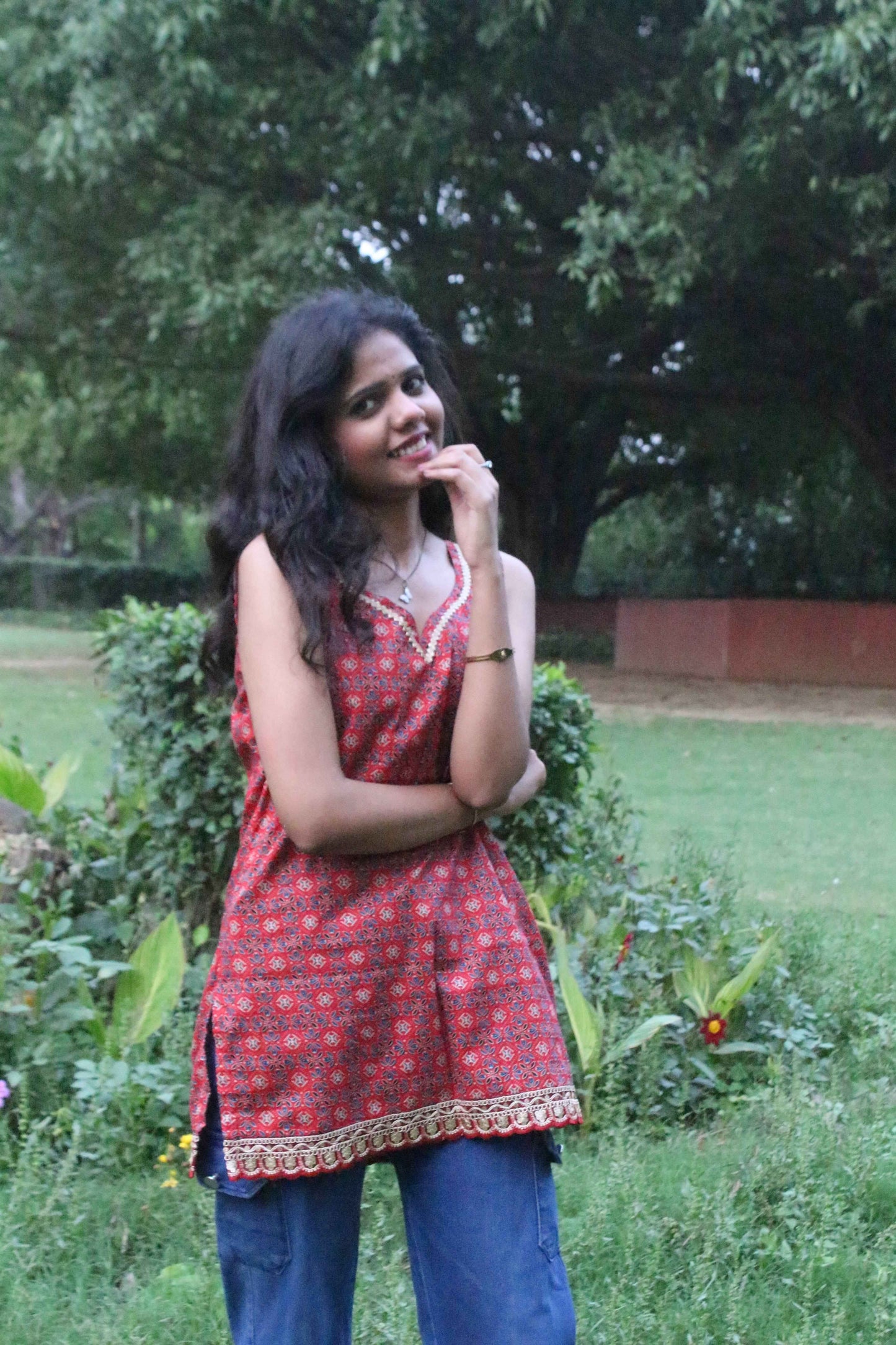 rust charm sleeveless kurti