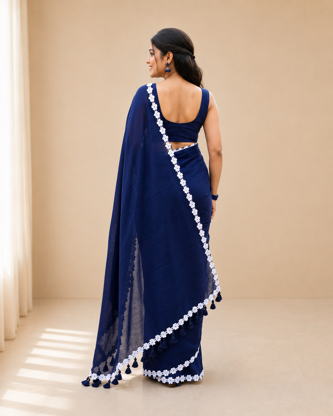 nisha blue mul cotton saree with delicate lace border