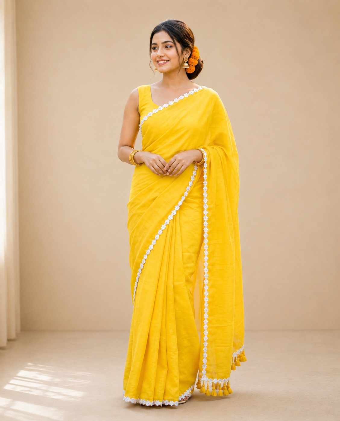 sasural genda phool yellow mul cotton saree with delicate lace border