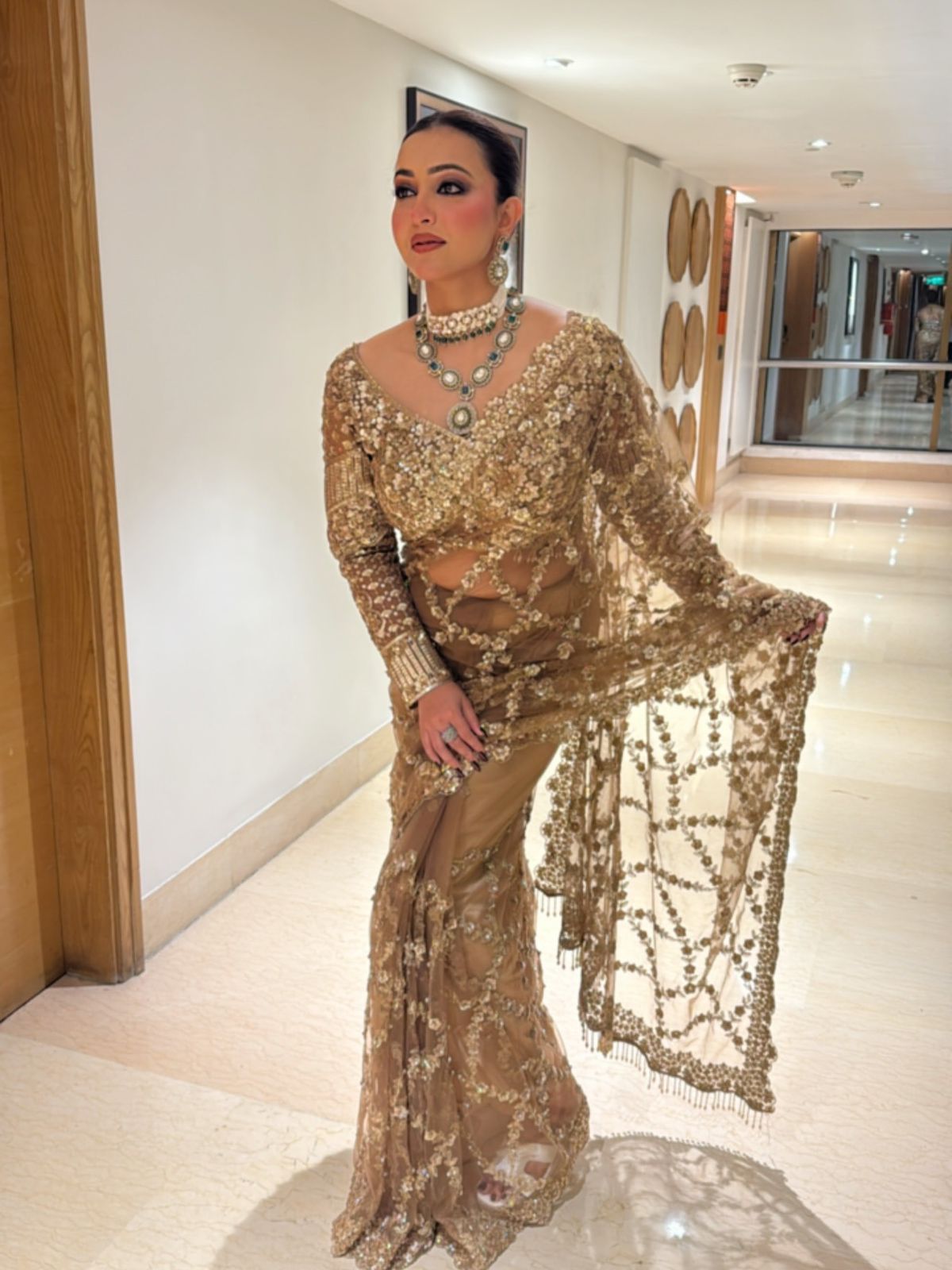 golden aura sequins embroidered net saree with designer blouse