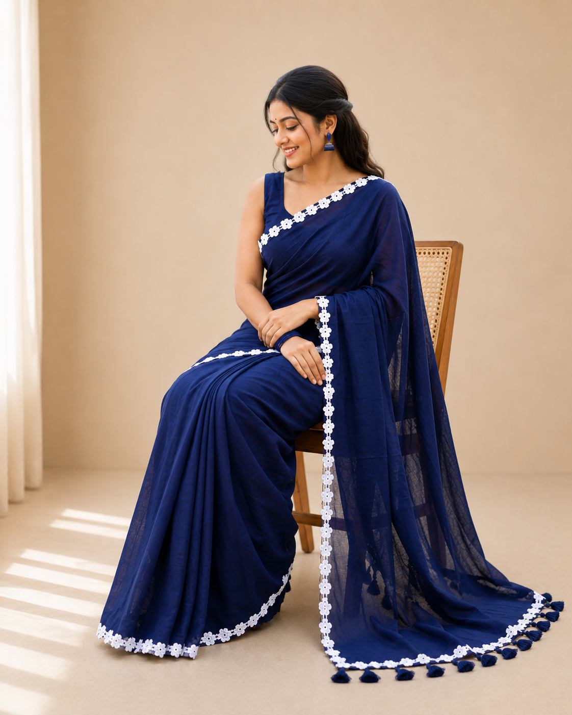 nisha blue mul cotton saree with delicate lace border